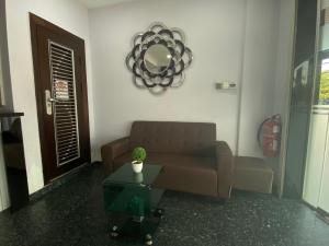 Posezení v ubytování Hotel O Hotel Hamilas