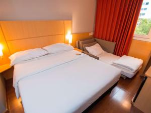 ibis Asuncion tesisinde bir odada yatak veya yataklar