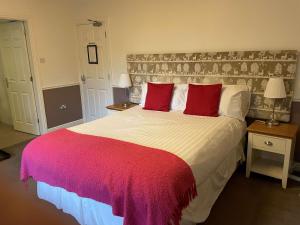 Postel nebo postele na pokoji v ubytování OYO New Inn Hotel