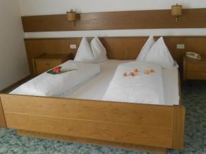En eller flere senge i et værelse på Garni Unterspeiser