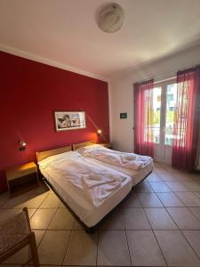 Postel nebo postele na pokoji v ubytování Andreis Apartments