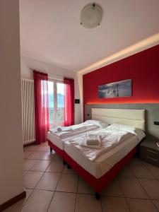 Postel nebo postele na pokoji v ubytování Andreis Apartments