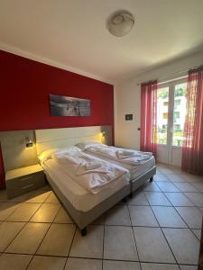 Postel nebo postele na pokoji v ubytování Andreis Apartments