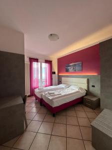 Postel nebo postele na pokoji v ubytování Andreis Apartments