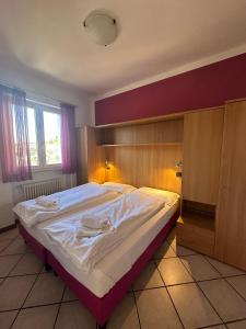 Postel nebo postele na pokoji v ubytování Andreis Apartments