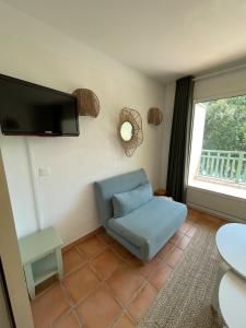 Et tv og/eller underholdning på Séjour Piscine, Forêt, Océan à Soustons Plage