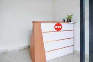 Majutusasutuses Hotel O Ilir Timur I Near Rsud Siti Fatimah Az-Zahra Formerly Lumendiva Suite olev sertifikaat, autasu, silt või muu dokument