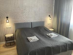 Ένα ή περισσότερα κρεβάτια σε δωμάτιο στο Panorama View I