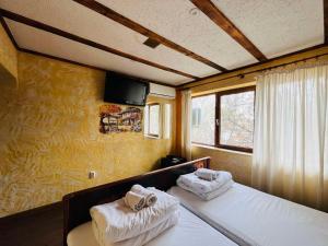 Ένα ή περισσότερα κρεβάτια σε δωμάτιο στο Rooms43 +34 φωτογραφίες