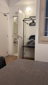 Posteľ alebo postele v izbe v ubytovaní Hostal Argo
