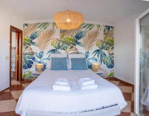 Posteľ alebo postele v izbe v ubytovaní Malaga Center Flat Hospitality