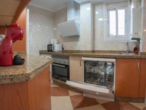 Kuchyňa alebo kuchynka v ubytovaní Malaga Center Flat Hospitality