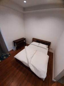 Postel nebo postele na pokoji v ubytování Baan Duang Khae Beach House