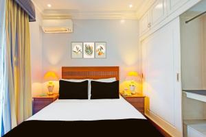 Postel nebo postele na pokoji v ubytování Townhouse OAK Makati Manila Near PNR Pasay Evangelista formerly VIP Suites