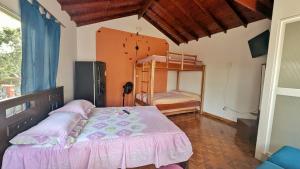 Cama o camas de una habitación en Chalet Real