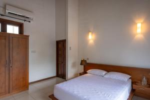 Five Palms Colombo客房内的一张或多张床位