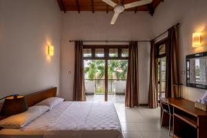 Five Palms Colombo客房内的一张或多张床位