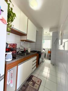 Køkken eller tekøkken på Ajuflat- Seu lar perto da Praia e da Orla de Atalaia com Ar condicionado e piscina + 26 billeder