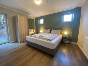 Katil atau katil-katil dalam bilik di Amaroo - Gästehaus "Charlotte" +17 gambar