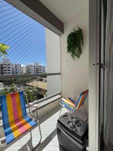 En balkon eller terrasse på Ajuflat- Seu lar perto da Praia e da Orla de Atalaia com Ar condicionado e piscina