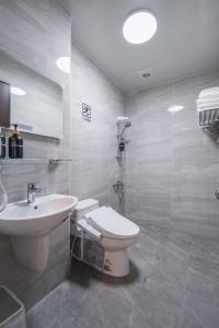 Koupelna v ubytování Shishi Homestay