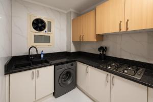 Kuchyň nebo kuchyňský kout v ubytování KweG + 2 fotografie