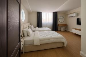 Postel nebo postele na pokoji v ubytování KweG