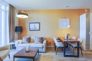 Χώρος καθιστικού στο First Garden View - Ihre Ferienwohnung im Ostseebad Wustrow