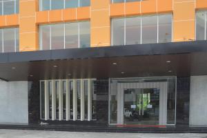 a building with an open door in front of it at Collection O Balikpapan Near Balikpapan Super Block Formerly City Inn Hotel in Balikpapan
