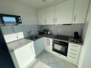 Kuchyň nebo kuchyňský kout v ubytování Studio für Geschäftsreisende