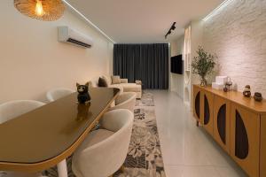 TV a/nebo společenská místnost v ubytování KweG