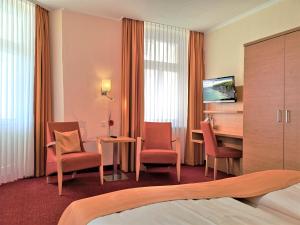 TV a/nebo společenská místnost v ubytování Hotel Villa Meeresgruss