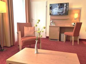 TV a/nebo společenská místnost v ubytování Hotel Villa Meeresgruss