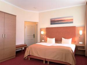 Postel nebo postele na pokoji v ubytování Hotel Villa Meeresgruss