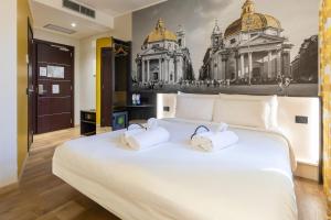 Postel nebo postele na pokoji v ubytování B&B Hotel Roma San Lorenzo Termini