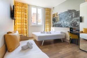 Postel nebo postele na pokoji v ubytování B&B Hotel Roma San Lorenzo Termini
