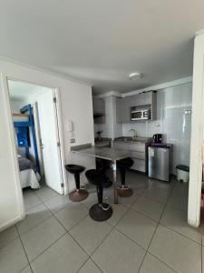 Kuchyň nebo kuchyňský kout v ubytování Arriendo diario iquique