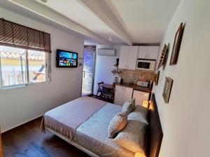 Kuchyň nebo kuchyňský kout v ubytování Apartamento Estudio Terraza Privada