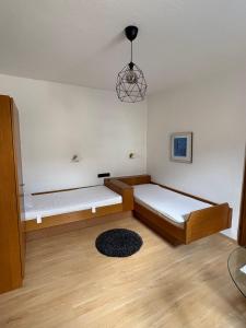 Postel nebo postele na pokoji v ubytování Hotel zum Erwin
