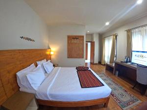 Postel nebo postele na pokoji v ubytování Gakyil Thimphu