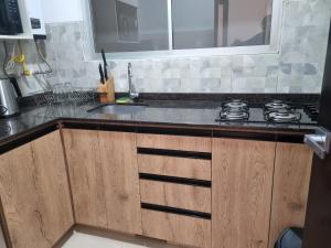 Kuchyň nebo kuchyňský kout v ubytování Acogedor y moderno apartamento, zona tranquila, vista espectacular