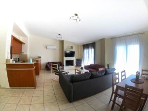 Kuchyň nebo kuchyňský kout v ubytování Luxury Beachfront Suite