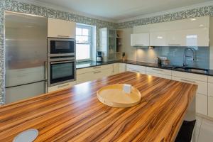Η κουζίνα ή μικρή κουζίνα στο Ferienhaus Larinae