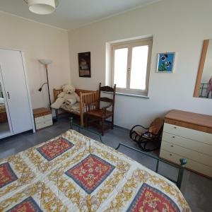 Postel nebo postele na pokoji v ubytování Casetta Rosatea + 9 fotografií