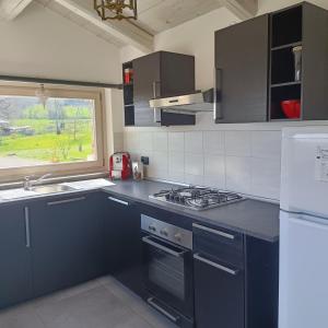 Kuchyň nebo kuchyňský kout v ubytování Casetta Rosatea