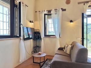 Χώρος καθιστικού στο Nuovissimo Loft panoramico con giardino a Montalcino
