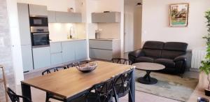 Kuchyň nebo kuchyňský kout v ubytování Superbe appartement neuf avec terrasse et parking privé