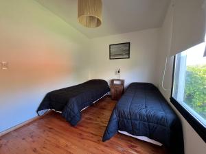 Ένα ή περισσότερα κρεβάτια σε δωμάτιο στο Dread Chapa Shack Casa 3