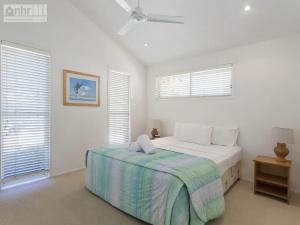 Ένα ή περισσότερα κρεβάτια σε δωμάτιο στο Witta Circle 65