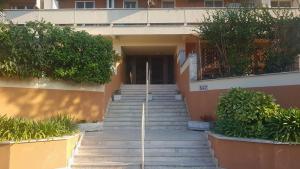 The facade or entrance of Casa Stazione Magliana